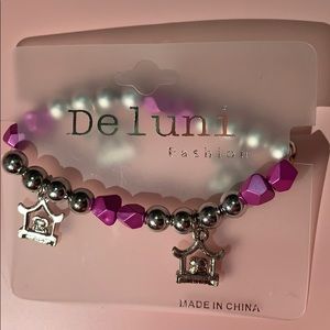 strechy crown heart pink bracelet.